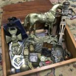 A small crate of collectable brass wares & silver, to include; Glasgow made horse doorstop, silver