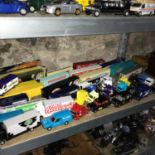 A Shelf of various lorry models which includes corgi