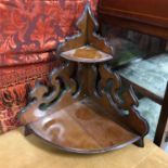 A Victorian two tier ornate corner shelf (52cm in height)