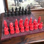 A Vintage oriental chess set, figures are made from plaster/chalk.