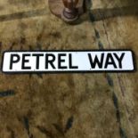 A Dunfermline street sign "Petrel Way" Made from metal has brackets to the back. Measures 84x15.5cm