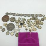 A Collection of silver three pences, silver George V Three pence piece bracelet, George III Crown,