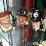 A Lot of three large Royal Doulton toby jugs "The Blacksmith, London Bobby & The Mad Hatter"