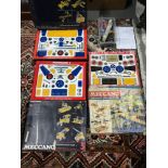 A Collection of vintage Meccano sets which includes Airport service set, Two Meccano kits and a
