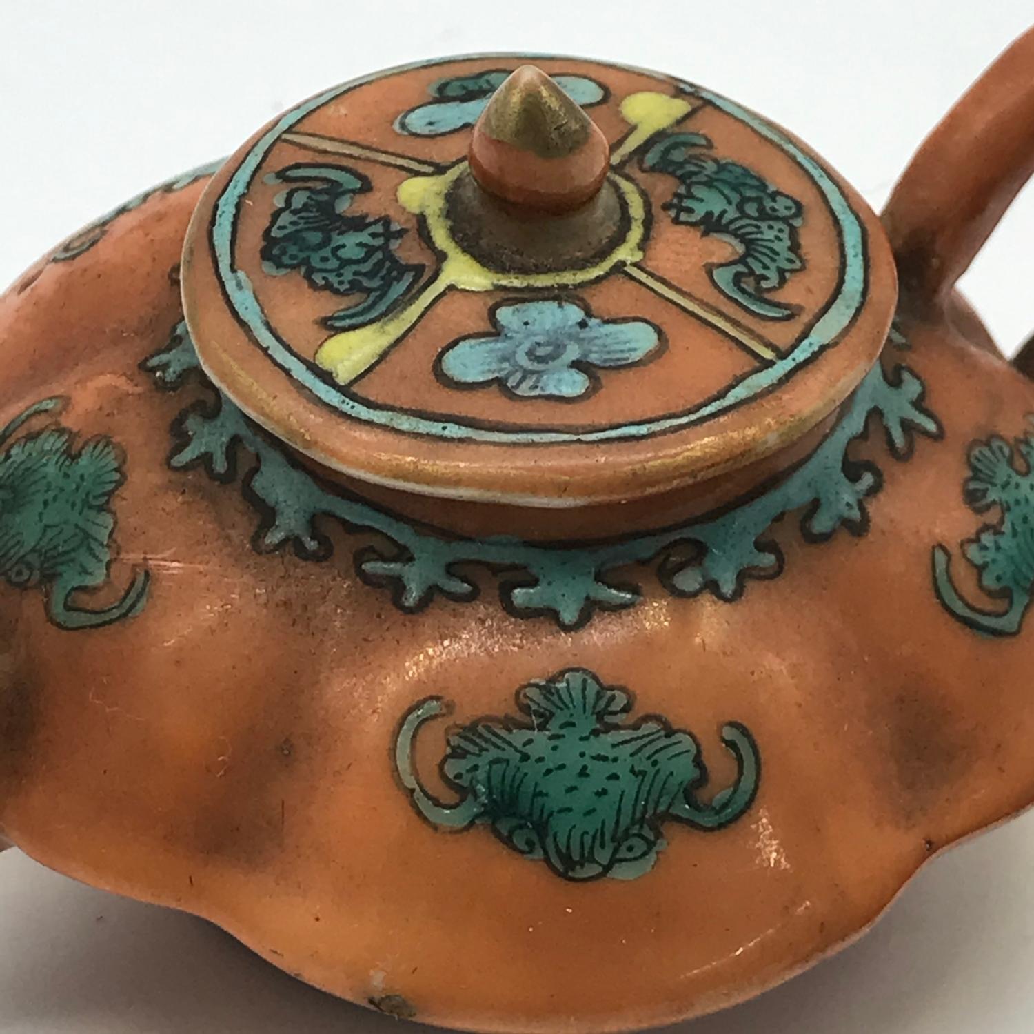 A 19th century orange and green hand painted miniature tea pot set with a dragon head spout. - Image 3 of 9