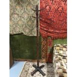 An Art Deco rustic style 8 branch coat stand.