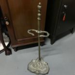 A Victorian ornate brass stick stand together with various walking sticks