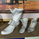 A Lot of three Vintage Nao porcelain boots two of which are Musketeer boots.