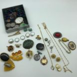 A Lot of vintage costume jewellery which includes Art Deco Gilt metal and amber brooch, various