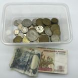 A Lot of mixed world bank notes and coins.