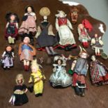 A Collection of vintage and antique dolls, Includes Porcelain head oriental doll, Bisque head