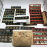 A Collection of Antique magic lantern slides. Showing various comical characters and transport.