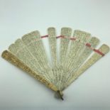 A Fine example of a early 19th century Chinese carved ivory & bone fan, Highly detailed figures