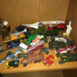 A Collection of Dinky and Corgi playworn models which includes military and plane models