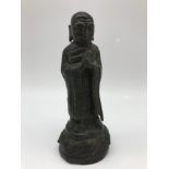 A 16th/ 17th century Chinese bronze figure of Kasyapa from the Ming Period, Measures 16.5cm in