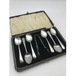 A Set of 6 Birmingham silver tea spoons with sugar tongs, Made by William Suckling Ltd. Comes with