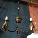 An Art Deco style bronze effect three branch ceiling light.