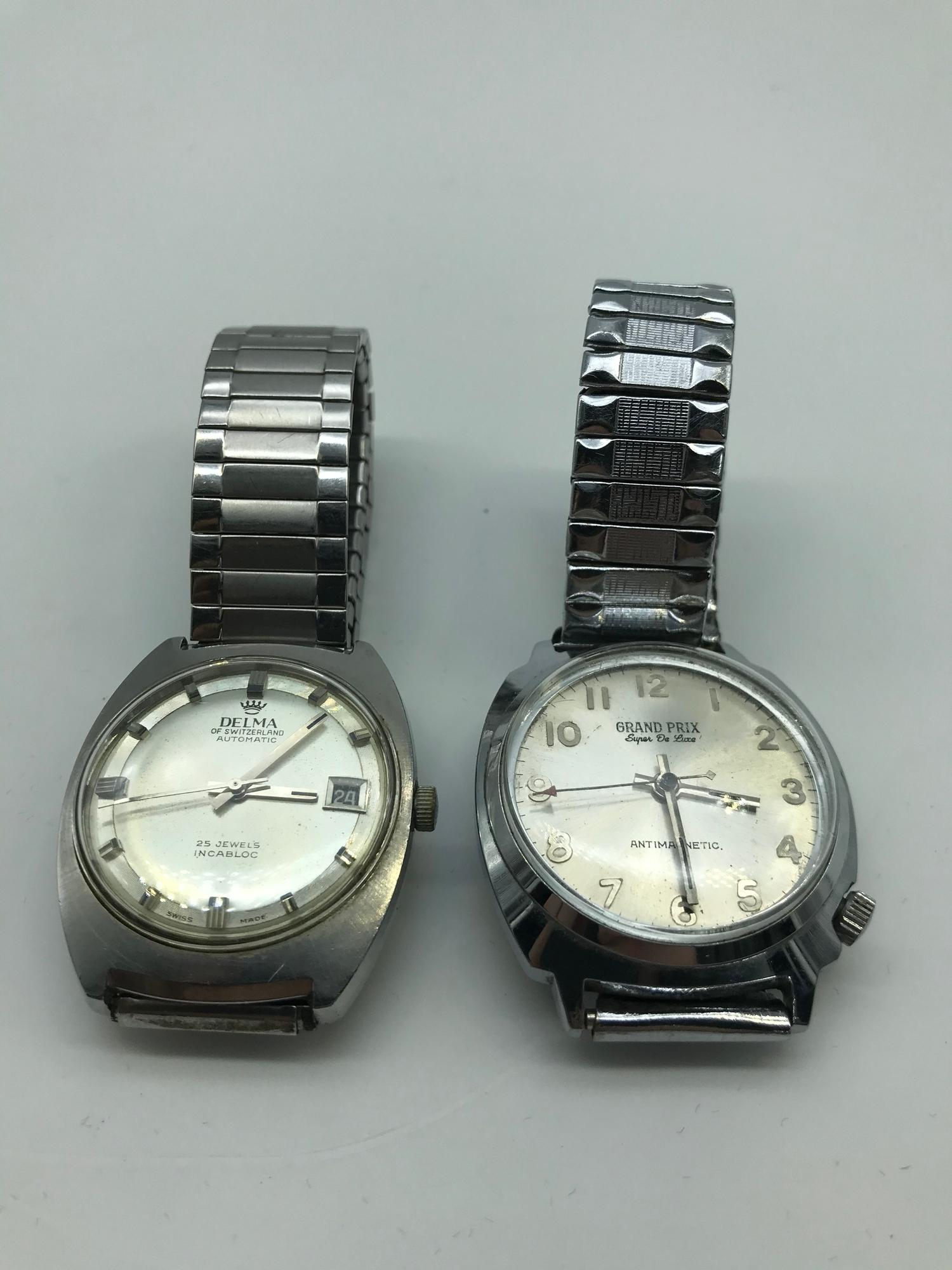 A Lot of two vintage gents watches which includes Delma of Switzerland Automatic 25 jewels
