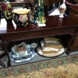 A Reproduction hard wood two drawer console table supported on ball and claw feet. Measures