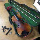 An Antique violin labelled Nicolaus Amatus Cremona 1680 Gebaut Deautsche Arbeit. Comes with two un-