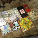 A Lot of vintage board games and card games which includes Monopoly board, Mickey Mouse Board,