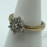 A London 9ct gold ladies 7 diamond ring [0.21ct of diamonds] [Ring size L] [weighs 3.2 grams]