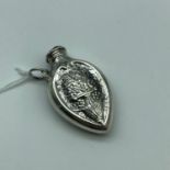 An ornate Birmingham Sterling silver scent/ snuff bottle [Maker L.T] [4.5cm in length]