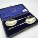 A Large pair of London silver apostle serving spoons, Made by William Hutton & Sons Ltd. Dated 1907.