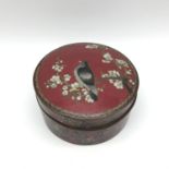 A 19th/early 20th century Chinese Cloisonne lidded pot, designed with a bird of prey sitting on a