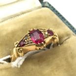 Antique Chester 18ct gold ladies ring, set with three pink stones and four diamond chips [ring