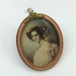 A Lovely example of an Antique miniature portrait painting [signed], showing a lady with pink