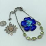 A Lot of Sterling silver jewellery which includes silver and enamel flower design brooch, Chester