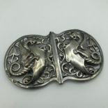 A heavy London silver belt buckle, design shows two dragons holding shields [William Hutton & Sons