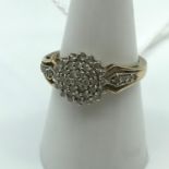 A Lovely example of a Ladies Birmingham 9ct gold Diamond cluster ring [0.50Ct diamonds] [Ring size