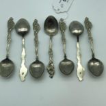 A Lot of seven Japanese 84 silver Moji dragon design spoons. Total weight 117.1grams