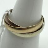 A Sheffield 9ct gold three tone band ring. Ring size N and weighs 3.1grams