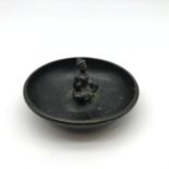 A 19th century (possibly earlier) bronze Chinese pin dish set with a figure to the centre of the