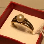 Antique Birmingham 9ct gold ladies ring set with a single pearl. Ring size P and weighs 3.44grams.