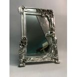 A Reproduction Art Nouveau lady figurine mirror. Measures 39.5x27cm