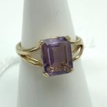 A Ladies 9ct gold set with a large cushion cut Amethyst stone. Ring size N and weighs 2.6grams