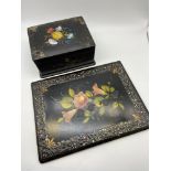A 19th century papermache desk storage box and matching binder. Both are hand painted with floral