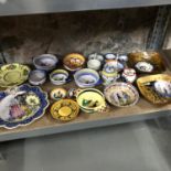 A Shelf of Hand painted Quimper porcelain wares.