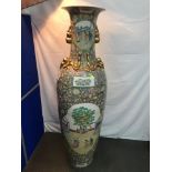 A large 20th century Chinese Famille Rose vase. Beautifully designed with figures and flowers.