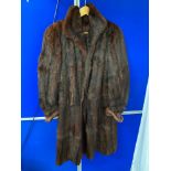 A Vintage ladies fur long coat.