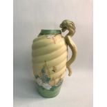 A Rare Art Deco 1910/20's hand painted vase, design shows butterfly and flowers. Attached to the