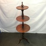 A Mahogany three tier dumb waiter. Measures 106cm in height