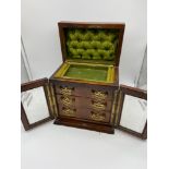 A Lovely example of a 19th century walnut jewel box. Designed with shield plaque and lift up lid,