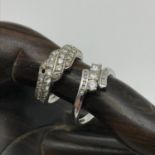 A Lot of two 9ct white gold ladies rings set with cz stones. Both ring size M & Total weight 5.