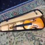 A Vintage Violin with two bows and case, Violin labelled to the inside 'Made in the workshops of