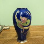 A Vintage Carlton ware dragon with clouds, blue background vase. [20cm in height]